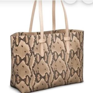 Consuela Margot East/West Tote features brown snake print. *Retired Print*